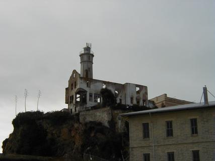 Warden's House and Lighthouse from the dock.  The Warden's House was destroyed by fire in 1970<br>Location: <a href="https://www.google.com/maps/search/?api=1&query=37.8266,-122.42082" target="_new">Alcatraz Island</a>